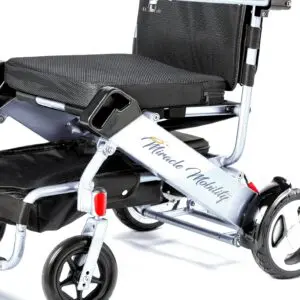 A wheelchair with a seat and back cushion.