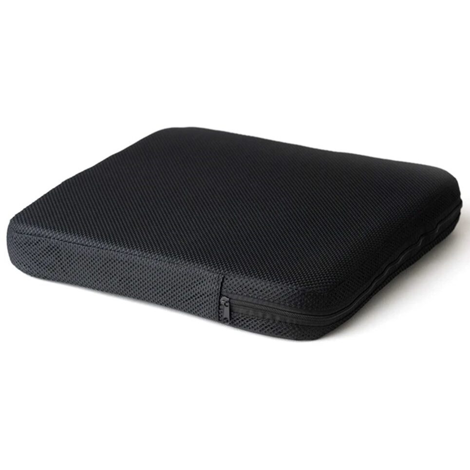 A black case sitting on top of a white table.
