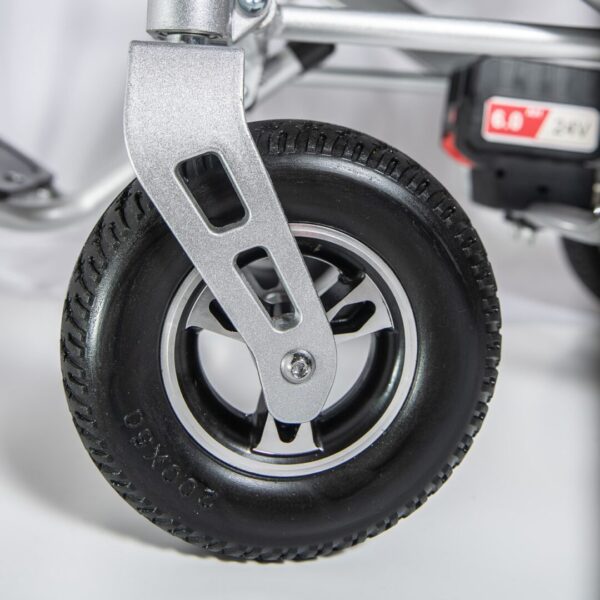 A close up of the tire on a scooter