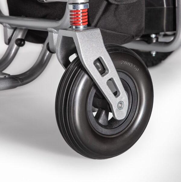 A close up of the wheels on a wheelchair