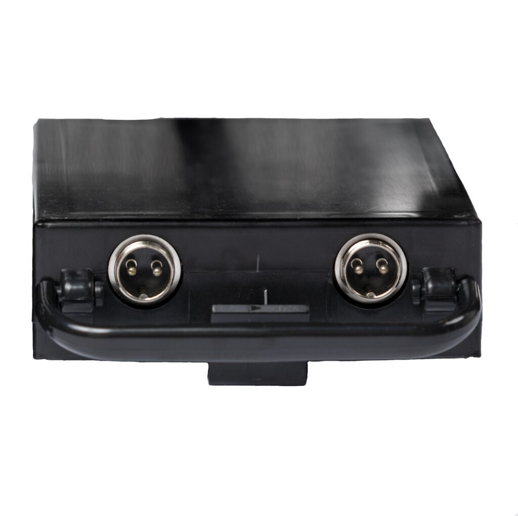 A black box with two wires attached to it.