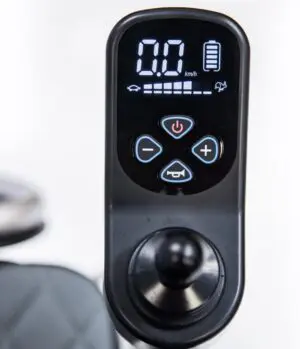 The control panel of the Joystick - Silver 6000 Plus electric scooter with a digital display.