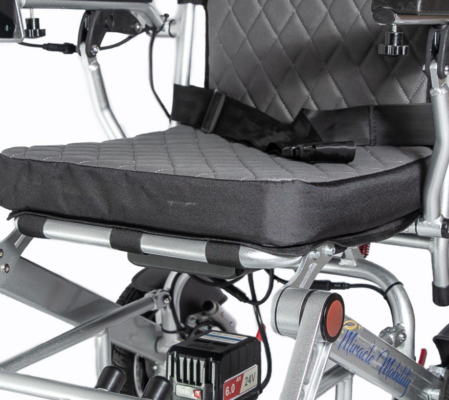 A close up of the seat cushion on a wheelchair