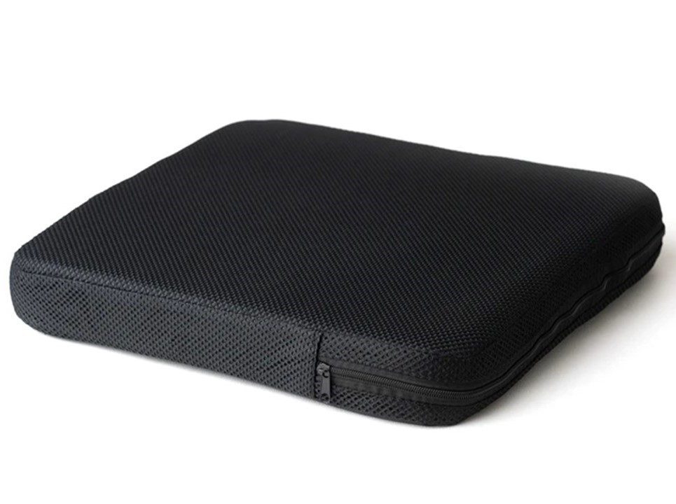 A black case is sitting on the ground.