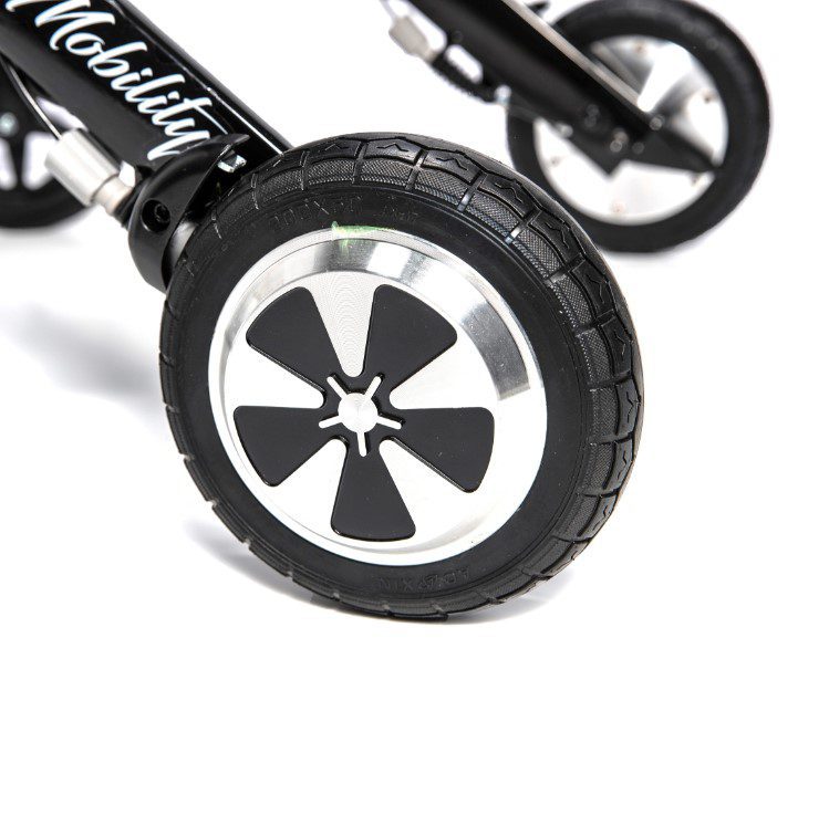 A close up of the wheel on a scooter