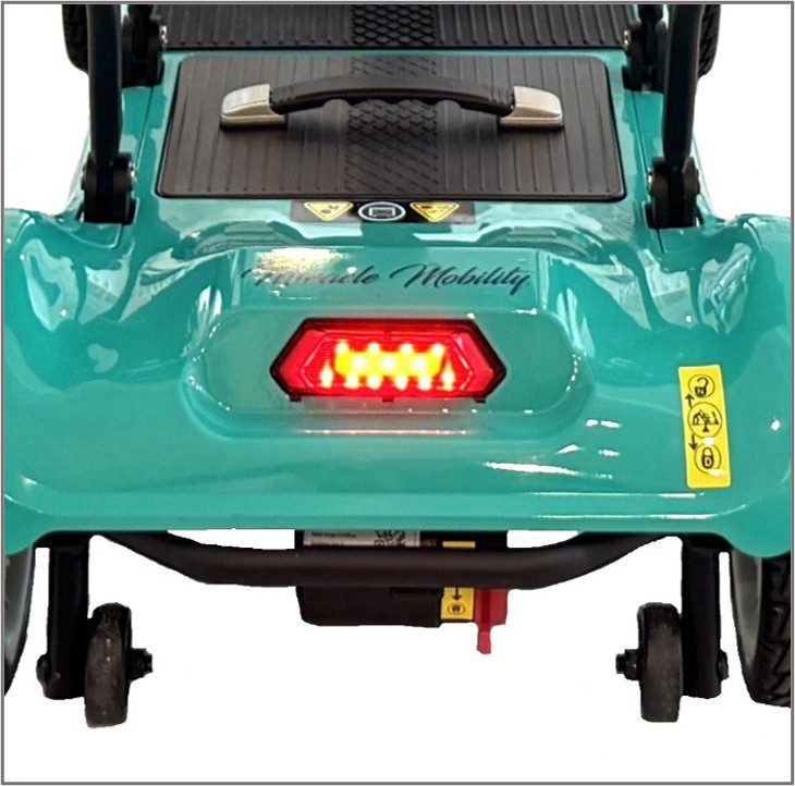 Teal mobility scooter rear with red taillight