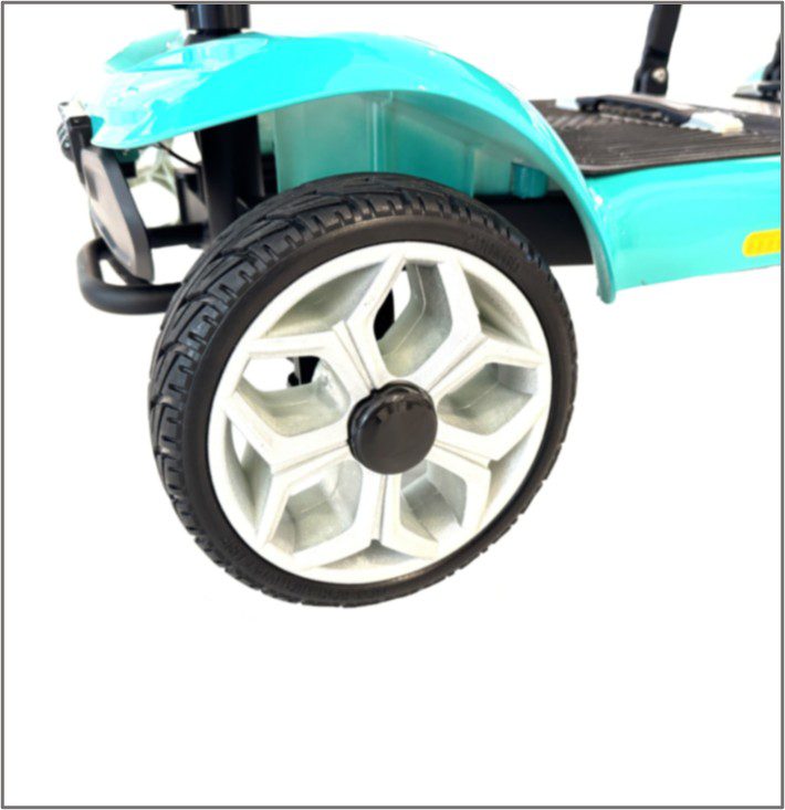 Close-up of teal mobility scooter wheel